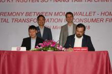 Momo and Home Credit Vietnam sign a cooperation agreement in Ho Chi Minh City on August 22 (Photo: VNA)