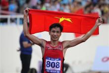 Runner Nguyen Van Lai is the focus of attention on the third day of athletics competitions at SEA Games 31. (Photo: VNA) 