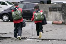 Junior high school students in Suzu, Ishikawa Prefecture, go to school on Jan. 22, 2024, as classes resume after the city in central Japan's Noto Peninsula was hit hard by a powerful earthquake on Jan. 1. (Kyodo)