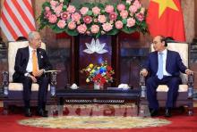 President Nguyen Xuan Phuc (R) and visiting Malaysian Prime Minister Dato’ Sri Ismail Sabri bin Yaakob. (Photo: VNA)