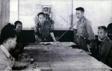 General Vo Nguyen Giap (standing, first from left) and other officers join a meeting to prepare for the Road 9 - Southern Laos campaign (File photo: VNA)