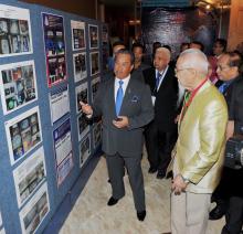 Malaysian DPM (left) visiting the exhibition held in conjunction with the 24th I