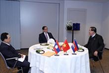 Prime Minister Pham Minh Chinh (centre) and his Lao and Cambodian counterparts Phankham Viphavanh (L) and Samdech Techo Hun Sen(Photo: VNA)