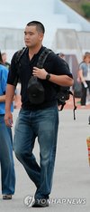 Son of Samsung's Lee joins military as naval officer candidate