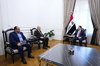 PM, Mohammed Shia Al-Sudani (right), Lebanese Minister of Labor, Mohammad Bahjat Haidar (left)