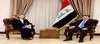 National Security Adviser Qasim Al-Araji (right), the Spanish Ambassador to Iraq, Alicia Rico Pérez (left)