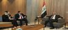 President Abdul Latif Jamal Rashid (right), Libyan FM Abdul Hadi Al-Hwaij (left)