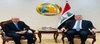 Deputy FM for Political Planning Affairs, Ambassador Hisham Al-Alawi, (right), Indonesian Ambassador to Baghdad, Didik Eko Bojiyanto (left)