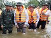 Party General Secretary To Lam (second, left) visits a flood-hit area in Khuong Pho Dong village, Quang Dien commune, Hue city. (Photo: VNA)